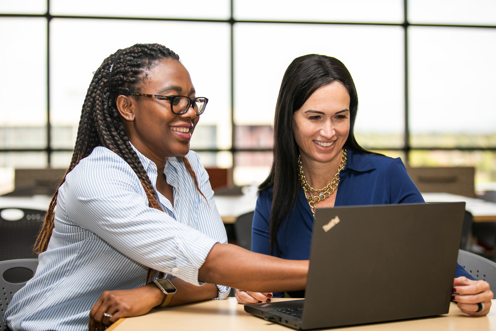 image of two students studying online